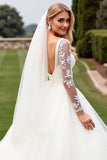 Ivory Organza Ball Gown Sweep Train Wedding Dress with Long Sleeves