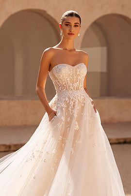 Ivory A Line Strapless Sweep Train Wedding Dress with Pockets