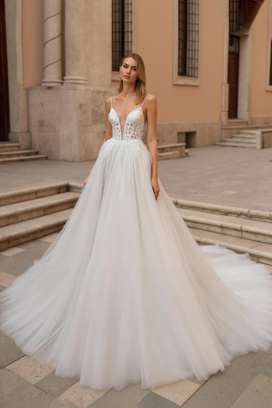 Ivory Spaghetti Straps Backless A Line Sweep Train Wedding Dress with Lace