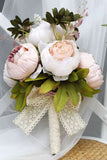 Blush Pink Hand Holding Flower Wedding Bouquet with Bow