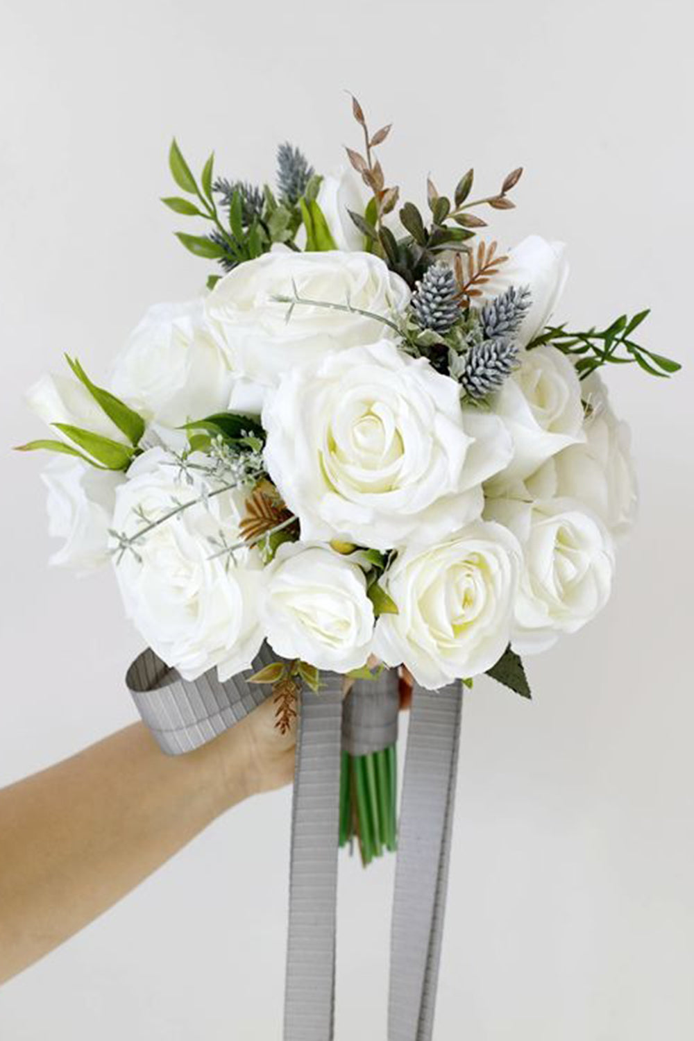 White Artificial Hand Holding Bridal Bouquet