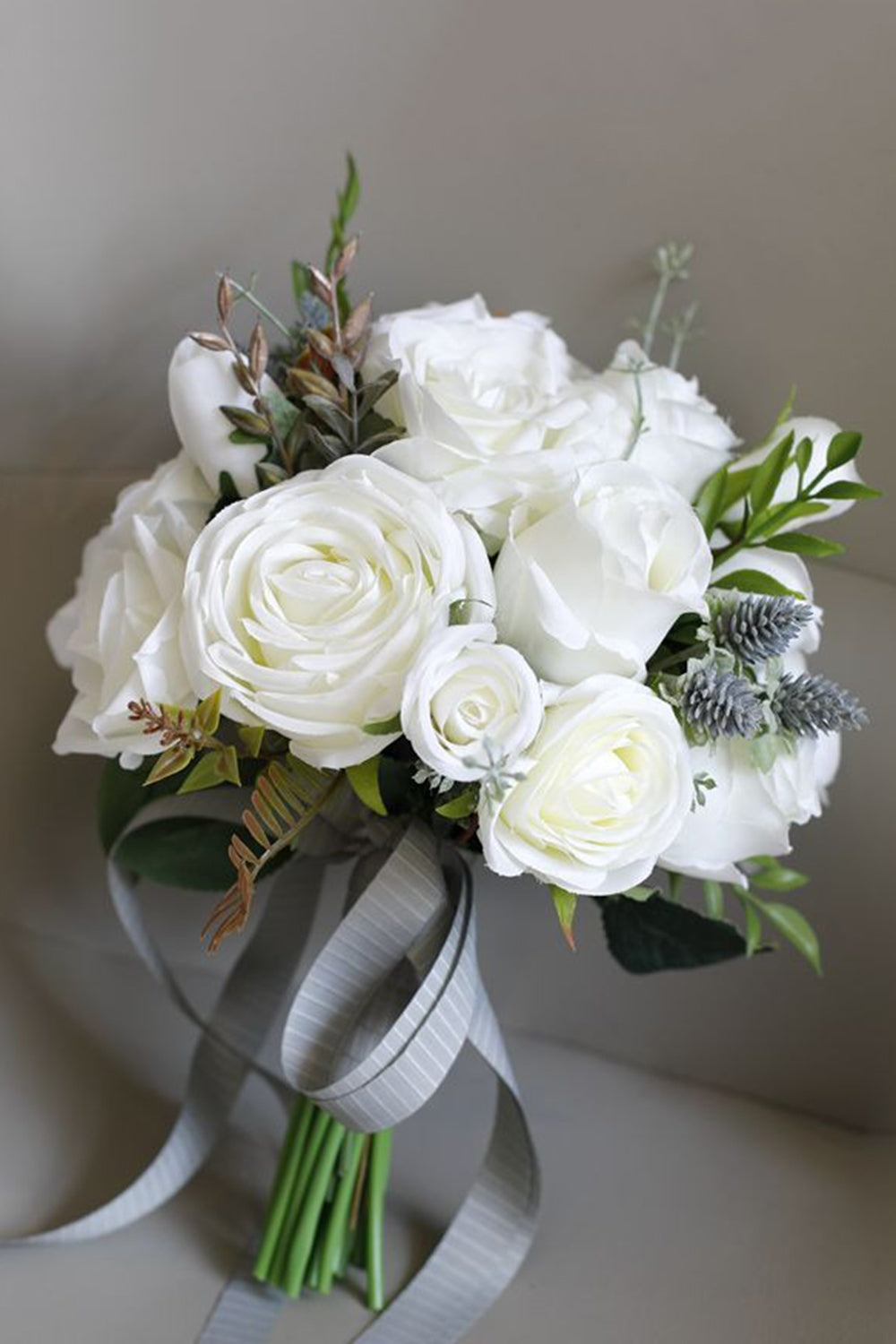 White Artificial Hand Holding Bridal Bouquet