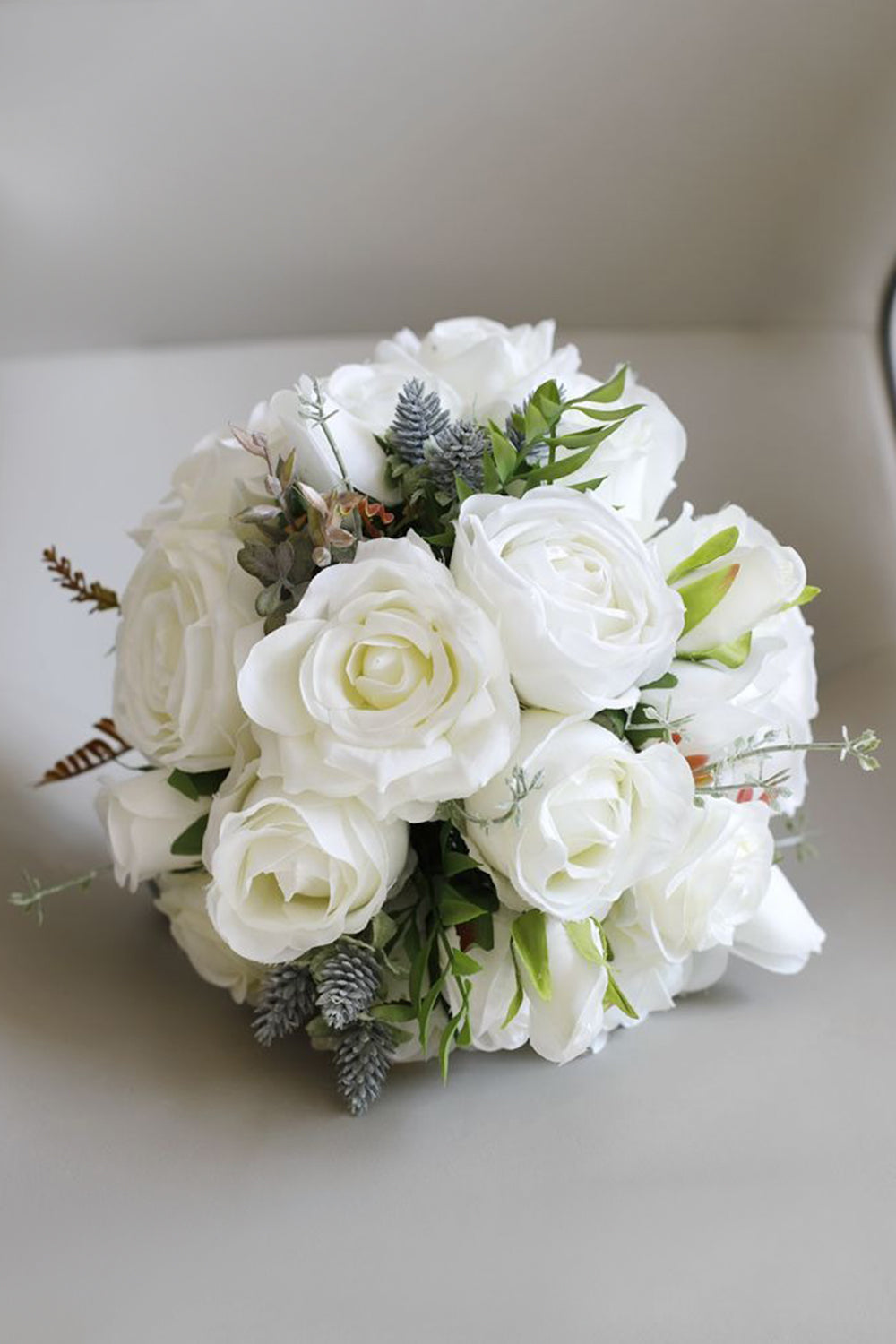 White Artificial Hand Holding Bridal Bouquet