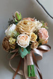 Champagne Hand Holding Flower Bridal Bouquet