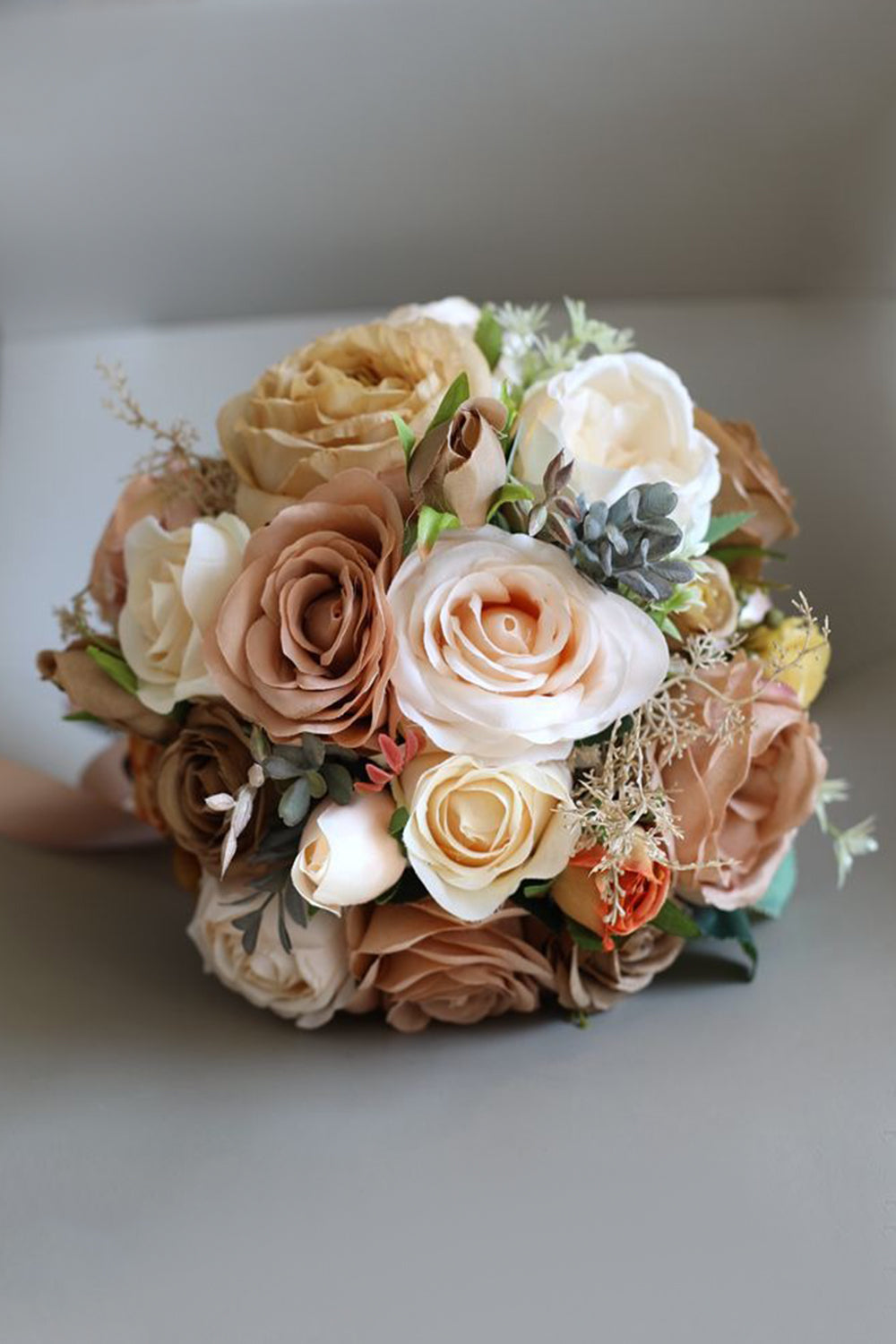 Champagne Hand Holding Flower Bridal Bouquet