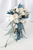 White and Blue Hand Holding Bridal Bouquet