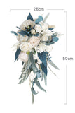 White and Blue Hand Holding Bridal Bouquet