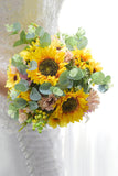 Yellow Hand Holding Bridal Bouquet with Bow