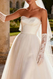 Ivory Tulle Strapless A Line Beaded Sweep Train Wedding Dress